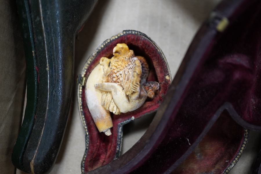 Six cased Meerschaum pipes and a cased amber and silver mounted pipe unused, together with smoking related books, longest pipe 17cm. Condition - most meerschaum pipes used therefore stained and smoking ends broken